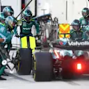 MIAMI, FLORIDA - MAY 05: Lance Stroll of Canada driving the (18) Aston Martin AMR24 Mercedes makes a pit stop during the F1 Grand Prix of Miami at Miami International Autodrome on May 04, 2024 in Miami, Florida. (Photo by Clive Rose - Formula 1/Formula 1 via Getty Images)