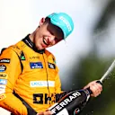 MIAMI, FLORIDA - MAY 05: Race winner Lando Norris of Great Britain and McLaren celebrates on the podium after the F1 Grand Prix of Miami at Miami International Autodrome on May 05, 2024 in Miami, Florida. (Photo by Clive Rose - Formula 1/Formula 1 via Getty Images)