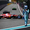MIAMI, FLORIDA - MAY 03: Charles Leclerc of Monaco and Ferrari walks from his car after spinning on track during practice ahead of the F1 Grand Prix of Miami at Miami International Autodrome on May 03, 2024 in Miami, Florida. (Photo by Clive Mason/Getty Images)
