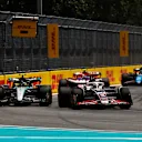 MIAMI, FLORIDA - MAY 04: Kevin Magnussen of Denmark driving the (20) Haas F1 VF-24 Ferrari leads Lewis Hamilton of Great Britain driving the (44) Mercedes AMG Petronas F1 Team W15 during the Sprint ahead of the F1 Grand Prix of Miami at Miami International Autodrome on May 04, 2024 in Miami, Florida. (Photo by Chris Graythen/Getty Images)