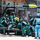 MIAMI, FLORIDA - MAY 04: Fernando Alonso of Spain driving the (14) Aston Martin AMR24 Mercedes makes a pitstop during the Sprint ahead of the F1 Grand Prix of Miami at Miami International Autodrome on May 04, 2024 in Miami, Florida. (Photo by Clive Rose - Formula 1/Formula 1 via Getty Images)