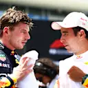MIAMI, FLORIDA - MAY 04: Sprint winner Max Verstappen of the Netherlands and Oracle Red Bull Racing talks with Third placed Sergio Perez of Mexico and Oracle Red Bull Racing in parc ferme during the Sprint ahead of the F1 Grand Prix of Miami at Miami International Autodrome on May 04, 2024 in Miami, Florida. (Photo by Mark Thompson/Getty Images)