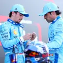 MIAMI, FLORIDA - MAY 04: Second placed qualifier Charles Leclerc of Monaco and Ferrari and Third placed qualifier Carlos Sainz of Spain and Ferrari talk in parc ferme during qualifying ahead of the F1 Grand Prix of Miami at Miami International Autodrome on May 04, 2024 in Miami, Florida. (Photo by Clive Rose - Formula 1/Formula 1 via Getty Images)