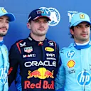 MIAMI, FLORIDA - MAY 04: Pole position qualifier Max Verstappen of the Netherlands and Oracle Red Bull Racing, Second placed qualifier Charles Leclerc of Monaco and Ferrari and Third placed qualifier Carlos Sainz of Spain and Ferrari pose for a photo in parc ferme during qualifying ahead of the F1 Grand Prix of Miami at Miami International Autodrome on May 04, 2024 in Miami, Florida. (Photo by Clive Rose - Formula 1/Formula 1 via Getty Images)