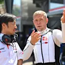 MONTE-CARLO, MONACO - MAY 26: Kevin Magnussen of Denmark and Haas F1 talks with Haas F1 Team Principal Ayao Komatsu on the grid prior to the F1 Grand Prix of Monaco at Circuit de Monaco on May 26, 2024 in Monte-Carlo, Monaco. (Photo by Rudy Carezzevoli/Getty Images)