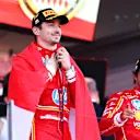 MONTE-CARLO, MONACO - MAY 26: Race winner Charles Leclerc of Monaco and Ferrari celebrates on the podium during the F1 Grand Prix of Monaco at Circuit de Monaco on May 26, 2024 in Monte-Carlo, Monaco. (Photo by Bryn Lennon - Formula 1/Formula 1 via Getty Images)
