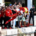 MONTE-CARLO, MONACO - MAY 26: Race winner Charles Leclerc of Monaco and Ferrari celebrates by jumping in the harbour after the F1 Grand Prix of Monaco at Circuit de Monaco on May 26, 2024 in Monte-Carlo, Monaco. (Photo by Clive Rose/Getty Images)