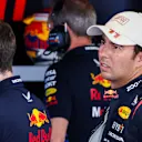 MONTE-CARLO, MONACO - MAY 25: 18th placed qualifier Sergio Perez of Mexico and Oracle Red Bull Racing looks on in the garage during qualifying ahead of the F1 Grand Prix of Monaco at Circuit de Monaco on May 25, 2024 in Monte-Carlo, Monaco. (Photo by Mark Thompson/Getty Images)