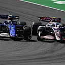 ZANDVOORT, NETHERLANDS - AUGUST 25: Nico Hulkenberg of Germany driving the (27) Haas F1 VF-24 Ferrari and Logan Sargeant of United States driving the (2) Williams FW46 Mercedes battle for track position during the F1 Grand Prix of Netherlands at Circuit Zandvoort on August 25, 2024 in Zandvoort, Netherlands. (Photo by Mark Thompson/Getty Images)