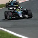 ZANDVOORT, NETHERLANDS - AUGUST 25: Lewis Hamilton of Great Britain driving the (44) Mercedes AMG Petronas F1 Team W15 leads Lance Stroll of Canada driving the (18) Aston Martin AMR24 Mercedes during the F1 Grand Prix of Netherlands at Circuit Zandvoort on August 25, 2024 in Zandvoort, Netherlands. (Photo by Joe Portlock/Getty Images)