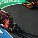 ZANDVOORT, NETHERLANDS - AUGUST 25: Charles Leclerc of Monaco driving the (16) Ferrari SF-24 leads Oscar Piastri of Australia driving the (81) McLaren MCL38 Mercedes during the F1 Grand Prix of Netherlands at Circuit Zandvoort on August 25, 2024 in Zandvoort, Netherlands. (Photo by Mark Thompson/Getty Images)