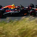 ZANDVOORT, NETHERLANDS - AUGUST 23: Sergio Perez of Mexico driving the (11) Oracle Red Bull Racing RB20 on track during practice ahead of the F1 Grand Prix of Netherlands at Circuit Zandvoort on August 23, 2024 in Zandvoort, Netherlands. (Photo by Joe Portlock/Getty Images)