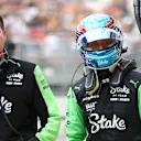 ZANDVOORT, NETHERLANDS - AUGUST 24: 19th placed qualifier Zhou Guanyu of China and Stake F1 Team Kick Sauber walks in the Pitlane during qualifying ahead of the F1 Grand Prix of Netherlands at Circuit Zandvoort on August 24, 2024 in Zandvoort, Netherlands. (Photo by Bryn Lennon - Formula 1/Formula 1 via Getty Images)