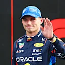 ZANDVOORT, NETHERLANDS - AUGUST 24: Second placed qualifier Max Verstappen of the Netherlands and Oracle Red Bull Racing acknowledges fans in parc ferme after qualifying ahead of the F1 Grand Prix of Netherlands at Circuit Zandvoort on August 24, 2024 in Zandvoort, Netherlands. (Photo by Mark Thompson/Getty Images)