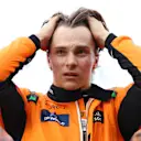 ZANDVOORT, NETHERLANDS - AUGUST 24: Third placed qualifier Oscar Piastri of Australia and McLaren looks on in parc ferme during qualifying ahead of the F1 Grand Prix of Netherlands at Circuit Zandvoort on August 24, 2024 in Zandvoort, Netherlands. (Photo by Bryn Lennon - Formula 1/Formula 1 via Getty Images)