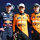 ZANDVOORT, NETHERLANDS - AUGUST 24: Second placed qualifier Max Verstappen of the Netherlands and Oracle Red Bull Racing, pole position qualifier Lando Norris of Great Britain and McLaren and third placed qualifier Oscar Piastri of Australia and McLaren pose for a photo in parc ferme after qualifying ahead of the F1 Grand Prix of Netherlands at Circuit Zandvoort on August 24, 2024 in Zandvoort, Netherlands. (Photo by Bryn Lennon - Formula 1/Formula 1 via Getty Images)