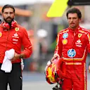 ZANDVOORT, NETHERLANDS - AUGUST 24: 11th placed qualifier Carlos Sainz of Spain and Ferrari walks in the Pitlane during qualifying ahead of the F1 Grand Prix of Netherlands at Circuit Zandvoort on August 24, 2024 in Zandvoort, Netherlands. (Photo by Bryn Lennon - Formula 1/Formula 1 via Getty Images)