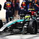 LUSAIL CITY, QATAR - DECEMBER 01: Lewis Hamilton of Great Britain driving the (44) Mercedes AMG Petronas F1 Team W15 has a puncture in the Pit Lane during the F1 Grand Prix of Qatar at Lusail International Circuit on December 01, 2024 in Lusail City, Qatar. (Photo by Peter Fox/Getty Images)