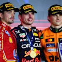 LUSAIL CITY, QATAR - DECEMBER 01: Race winner Max Verstappen of the Netherlands and Oracle Red Bull Racing (C), Second placed Charles Leclerc of Monaco and Ferrari (L) and Third placed Oscar Piastri of Australia and McLaren (R) celebrate on the podium during the F1 Grand Prix of Qatar at Lusail International Circuit on December 01, 2024 in Lusail City, Qatar. (Photo by James Sutton - Formula 1/Formula 1 via Getty Images)