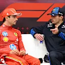 LUSAIL CITY, QATAR - DECEMBER 01: Race winner Max Verstappen of the Netherlands and Oracle Red Bull Racing and Charles Leclerc of Monaco and Ferrari attend the press conference after the F1 Grand Prix of Qatar at Lusail International Circuit on December 01, 2024 in Lusail City, Qatar. (Photo by Mark Sutton/Getty Images)