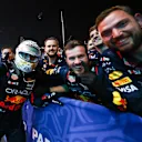 LUSAIL CITY, QATAR - DECEMBER 01: Race winner Max Verstappen of the Netherlands and Oracle Red Bull Racing celebrates with Oracle Red Bull Racing team members in parc ferme during the F1 Grand Prix of Qatar at Lusail International Circuit on December 01, 2024 in Lusail City, Qatar. (Photo by Mark Thompson/Getty Images)