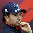 LUSAIL CITY, QATAR - NOVEMBER 28: Sergio Perez of Mexico and Oracle Red Bull Racing attends the Drivers Press Conference during previews ahead of the F1 Grand Prix of Qatar at Lusail International Circuit on November 28, 2024 in Lusail City, Qatar. (Photo by Bryn Lennon/Getty Images)