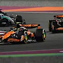 LUSAIL CITY, QATAR - NOVEMBER 30: Lando Norris of Great Britain driving the (4) McLaren MCL38 Mercedes leads Oscar Piastri of Australia driving the (81) McLaren MCL38 Mercedes and George Russell of Great Britain driving the (63) Mercedes AMG Petronas F1 Team W15 on track during the Sprint ahead of the F1 Grand Prix of Qatar at Lusail International Circuit on November 30, 2024 in Lusail City, Qatar. (Photo by Mark Sutton - Formula 1/Formula 1 via Getty Images)