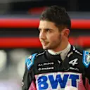 LUSAIL CITY, QATAR - NOVEMBER 30: 20th placed qualifier Esteban Ocon of France and Alpine F1 walks in the Pitlane during qualifying ahead of the F1 Grand Prix of Qatar at Lusail International Circuit on November 30, 2024 in Lusail City, Qatar. (Photo by Bryn Lennon - Formula 1/Formula 1 via Getty Images)