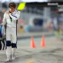 LUSAIL CITY, QATAR - NOVEMBER 30: 19th placed qualifier Franco Colapinto of Argentina and Williams walks in the Pitlane during qualifying ahead of the F1 Grand Prix of Qatar at Lusail International Circuit on November 30, 2024 in Lusail City, Qatar. (Photo by Bryn Lennon - Formula 1/Formula 1 via Getty Images)
