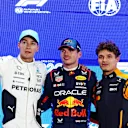 LUSAIL CITY, QATAR - NOVEMBER 30: Pole position qualifier Max Verstappen of the Netherlands and Oracle Red Bull Racing, Second placed qualifier George Russell of Great Britain and Mercedes and Third placed Lando Norris of Great Britain and McLaren pose for a photo in parc ferme during qualifying ahead of the F1 Grand Prix of Qatar at Lusail International Circuit on November 30, 2024 in Lusail City, Qatar. (Photo by Mark Thompson/Getty Images)