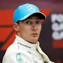 LUSAIL CITY, QATAR - NOVEMBER 30: Second placed qualifier George Russell of Great Britain and Mercedes attends the press conference after qualifying ahead of the F1 Grand Prix of Qatar at Lusail International Circuit on November 30, 2024 in Lusail City, Qatar. (Photo by Bryn Lennon/Getty Images)