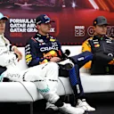 LUSAIL CITY, QATAR - NOVEMBER 30: Pole position qualifier Max Verstappen of the Netherlands and Oracle Red Bull Racing, Second placed qualifier George Russell of Great Britain and Mercedes, and Third placed qualifier Lando Norris of Great Britain and McLaren attend the press conference after qualifying ahead of the F1 Grand Prix of Qatar at Lusail International Circuit on November 30, 2024 in Lusail City, Qatar. (Photo by Bryn Lennon/Getty Images)
