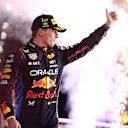 JEDDAH, SAUDI ARABIA - MARCH 09: Race winner Max Verstappen of the Netherlands and Oracle Red Bull Racing celebrates on the podium during the F1 Grand Prix of Saudi Arabia at Jeddah Corniche Circuit on March 09, 2024 in Jeddah, Saudi Arabia. (Photo by Bryn Lennon - Formula 1/Formula 1 via Getty Images)