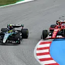 BARCELONA, SPAIN - JUNE 23: Lewis Hamilton of Great Britain driving the (44) Mercedes AMG Petronas F1 Team W15 and Carlos Sainz of Spain driving (55) the Ferrari SF-24 battle for track position during the F1 Grand Prix of Spain at Circuit de Barcelona-Catalunya on June 23, 2024 in Barcelona, Spain. (Photo by Mark Sutton - Formula 1/Formula 1 via Getty Images)