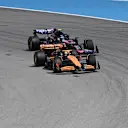 BARCELONA, SPAIN - JUNE 23: Oscar Piastri of Australia driving the (81) McLaren MCL38 Mercedes leads Pierre Gasly of France driving the (10) Alpine F1 A524 Renault during the F1 Grand Prix of Spain at Circuit de Barcelona-Catalunya on June 23, 2024 in Barcelona, Spain. (Photo by Mark Sutton - Formula 1/Formula 1 via Getty Images)