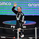 BARCELONA, SPAIN - JUNE 23: Third placed Lewis Hamilton of Great Britain and Mercedes celebrates on the podium during the F1 Grand Prix of Spain at Circuit de Barcelona-Catalunya on June 23, 2024 in Barcelona, Spain. (Photo by James Sutton - Formula 1/Formula 1 via Getty Images)