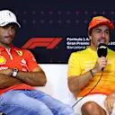 BARCELONA, SPAIN - JUNE 20: Carlos Sainz of Spain and Ferrari and Fernando Alonso of Spain and Aston Martin F1 Team attend the press conference during previews ahead of the F1 Grand Prix of Spain at Circuit de Barcelona-Catalunya on June 20, 2024 in Barcelona, Spain. (Photo by Clive Rose/Getty Images)