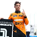 BARCELONA, SPAIN - JUNE 22: Pole position qualifier Lando Norris of Great Britain and McLaren celebrates in parc ferme during qualifying ahead of the F1 Grand Prix of Spain at Circuit de Barcelona-Catalunya on June 22, 2024 in Barcelona, Spain. (Photo by Clive Rose - Formula 1/Formula 1 via Getty Images)