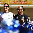 AUSTIN, TEXAS - OCTOBER 20: George Russell of Great Britain and Mercedes and Lewis Hamilton of Great Britain and Mercedes look on from the drivers parade prior to the F1 Grand Prix of United States at Circuit of The Americas on October 20, 2024 in Austin, Texas. (Photo by Peter Fox - Formula 1/Formula 1 via Getty Images)