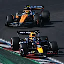 AUSTIN, TEXAS - OCTOBER 20: Max Verstappen of the Netherlands driving the (1) Oracle Red Bull Racing RB20 leads Lando Norris of Great Britain driving the (4) McLaren MCL38 Mercedes on track during the F1 Grand Prix of United States at Circuit of The Americas on October 20, 2024 in Austin, Texas. (Photo by Mark Sutton/Getty Images)