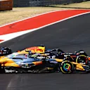 AUSTIN, TEXAS - OCTOBER 20: Max Verstappen of the Netherlands driving the (1) Oracle Red Bull Racing RB20 and Lando Norris of Great Britain driving the (4) McLaren MCL38 Mercedes battle for position during the F1 Grand Prix of United States at Circuit of The Americas on October 20, 2024 in Austin, Texas. (Photo by Mark Thompson/Getty Images)