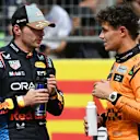AUSTIN, TEXAS - OCTOBER 19: Sprint winner Max Verstappen of the Netherlands and Oracle Red Bull Racing and Third placed Lando Norris of Great Britain and McLaren talk in parc ferme during the Sprint ahead of the F1 Grand Prix of United States at Circuit of The Americas on October 19, 2024 in Austin, Texas. (Photo by Mark Sutton/Getty Images)