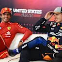 AUSTIN, TEXAS - OCTOBER 19: Sprint winner Max Verstappen of the Netherlands and Oracle Red Bull Racing talks with Second placed Carlos Sainz of Spain and Ferrari in the press conference after the Sprint ahead of the F1 Grand Prix of United States at Circuit of The Americas on October 19, 2024 in Austin, Texas. (Photo by Mark Sutton/Getty Images)