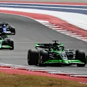 AUSTIN, TEXAS - OCTOBER 19: Valtteri Bottas of Finland driving the (77) Kick Sauber C44 Ferrari leads Zhou Guanyu of China driving the (24) Kick Sauber C44 Ferrari during the Sprint ahead of the F1 Grand Prix of United States at Circuit of The Americas on October 19, 2024 in Austin, Texas. (Photo by Mark Sutton/Getty Images)