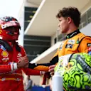 AUSTIN, TEXAS - OCTOBER 19: Pole position qualifier Lando Norris of Great Britain and McLaren is congratulated by Third placed qualifier Carlos Sainz of Spain and Ferrari in parc ferme during qualifying ahead of the F1 Grand Prix of United States at Circuit of The Americas on October 19, 2024 in Austin, Texas. (Photo by Bryn Lennon - Formula 1/Formula 1 via Getty Images)
