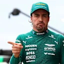 MELBOURNE, AUSTRALIA - MARCH 15: Twelth placed qualifier Fernando Alonso of Spain and Aston Martin F1 Team looks on in the Pitlane during qualifying ahead of the F1 Grand Prix of Australia at Albert Park Grand Prix Circuit on March 15, 2025 in Melbourne, Australia. (Photo by Bryn Lennon - Formula 1/Formula 1 via Getty Images)