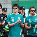 SHANGHAI, CHINA - MARCH 23: Gabriel Bortoleto of Brazil and Stake F1 Team Kick Sauber Lance Stroll of Canada and Aston Martin F1 Team and Fernando Alonso of Spain and Aston Martin F1 Team at the tribute to the late Eddie Jordan prior to the F1 Grand Prix of China at Shanghai International Circuit on March 23, 2025 in Shanghai, China. (Photo by Bryn Lennon - Formula 1/Formula 1 via Getty Images)