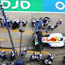 SHANGHAI, CHINA - MARCH 23: Yuki Tsunoda of Japan driving the (22) Visa Cash App Racing Bulls VCARB 02 makes a pitstop during the F1 Grand Prix of China at Shanghai International Circuit on March 23, 2025 in Shanghai, China. (Photo by Bryn Lennon - Formula 1/Formula 1 via Getty Images)