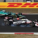 SHANGHAI, CHINA - MARCH 23: Oliver Bearman of Great Britain driving the (87) Haas F1 VF-25 Ferrari leads Lance Stroll of Canada driving the (18) Aston Martin F1 Team AMR25 Mercedes on track during the F1 Grand Prix of China at Shanghai International Circuit on March 23, 2025 in Shanghai, China. (Photo by Clive Mason/Getty Images)