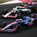 SHANGHAI, CHINA - MARCH 23: Pierre Gasly of France driving the (10) Alpine F1 A525 Renault leads Oliver Bearman of Great Britain driving the (87) Haas F1 VF-25 Ferrari on track during the F1 Grand Prix of China at Shanghai International Circuit on March 23, 2025 in Shanghai, China. (Photo by Clive Mason/Getty Images)